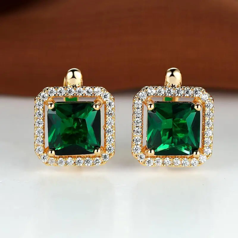 Pendientes dorados con circonita verde cuadrada | Oro