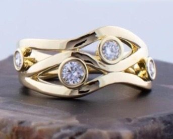 Anillo Espiral con circonitas | Oro