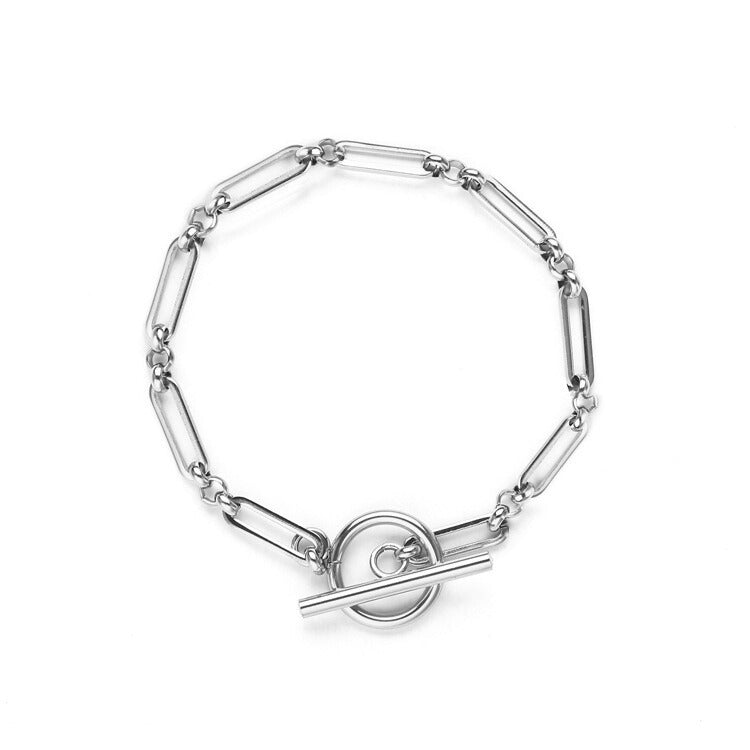 Pulsera de eslabones con cierre en T | Oro blanco