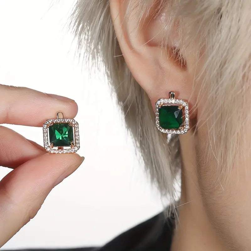 Pendientes dorados con circonita verde cuadrada | Oro