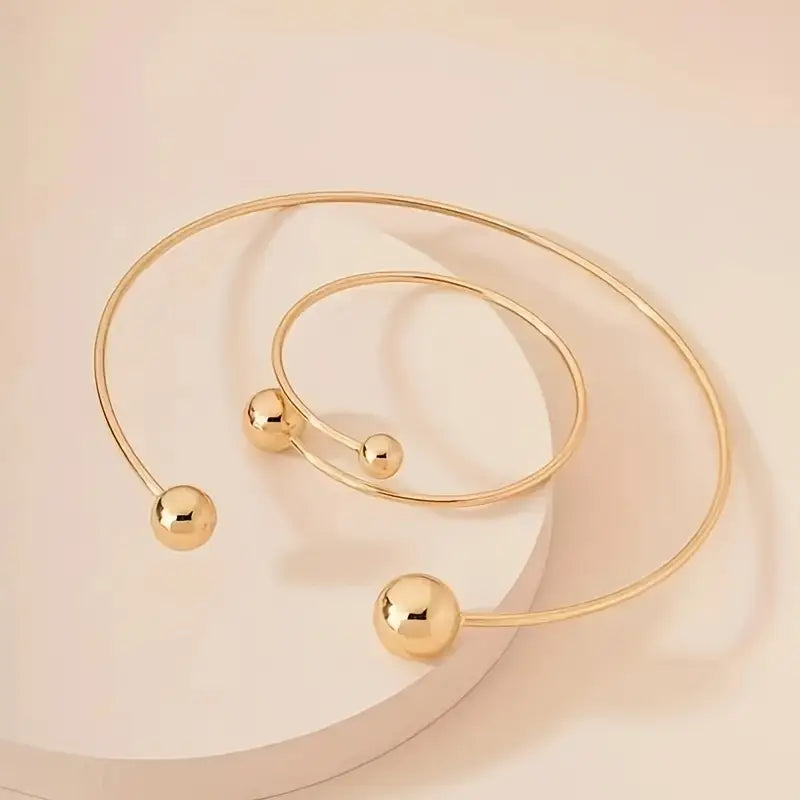 Set de gargantilla y brazalete Brillo | Oro