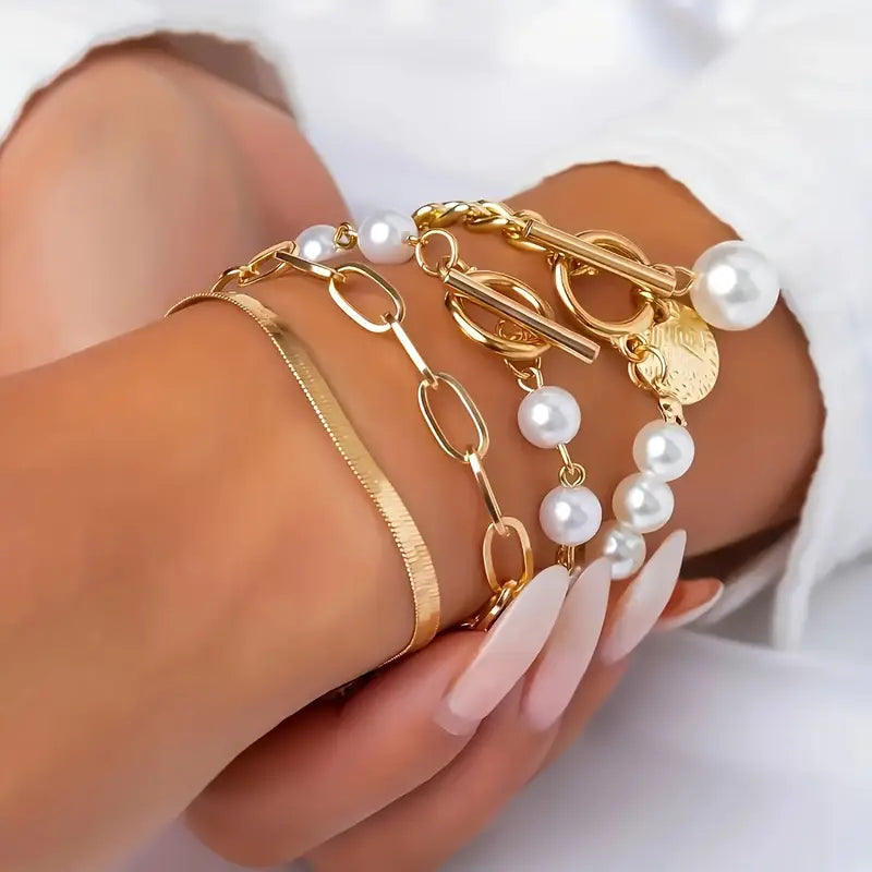 Set de 4 pulseras: serpiente, perlas y eslabones | Oro
