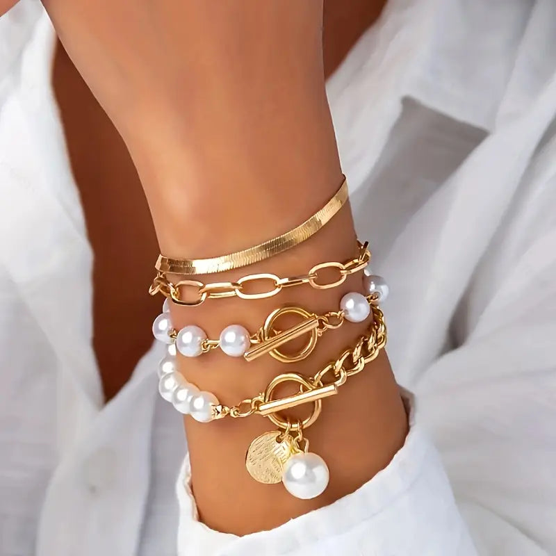 Set de 4 pulseras: serpiente, perlas y eslabones | Oro