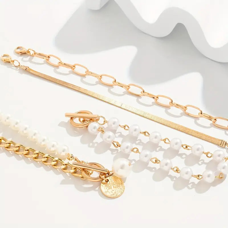 Set de 4 pulseras: serpiente, perlas y eslabones | Oro