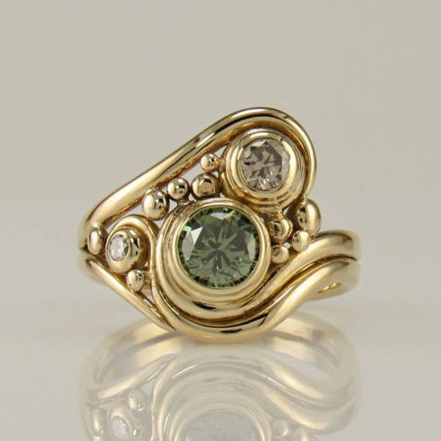 Anillo antiguo con circonita verde dorada | Oro