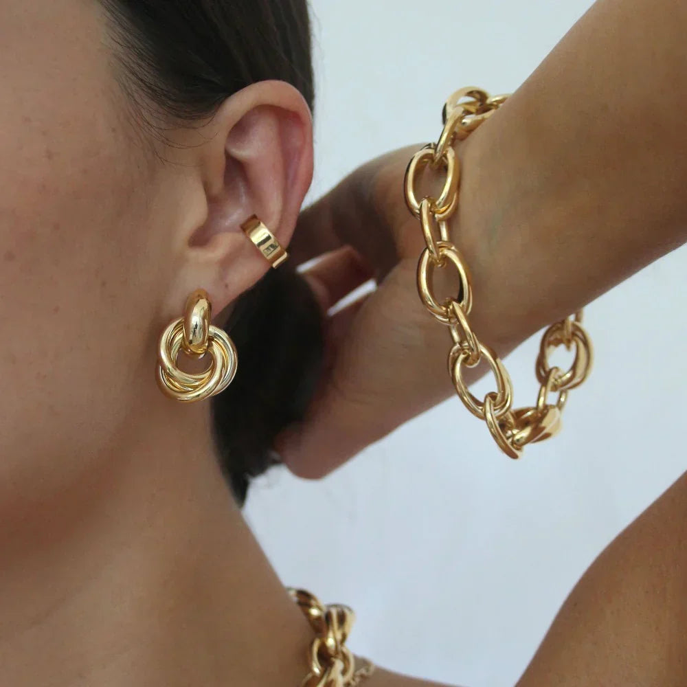 Pendientes statement entrelazados | Oro