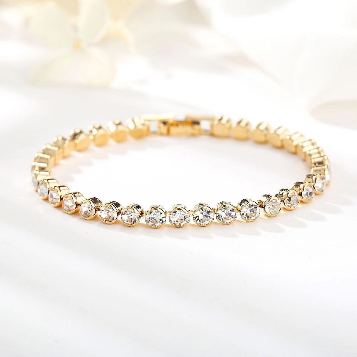 Pulsera tenis talla redonda | Oro