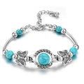Pulsera Mariposas Oasis | Oro blanco