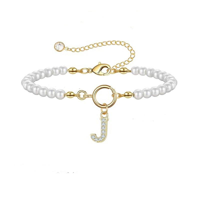 Pulsera con letra Llave | Oro