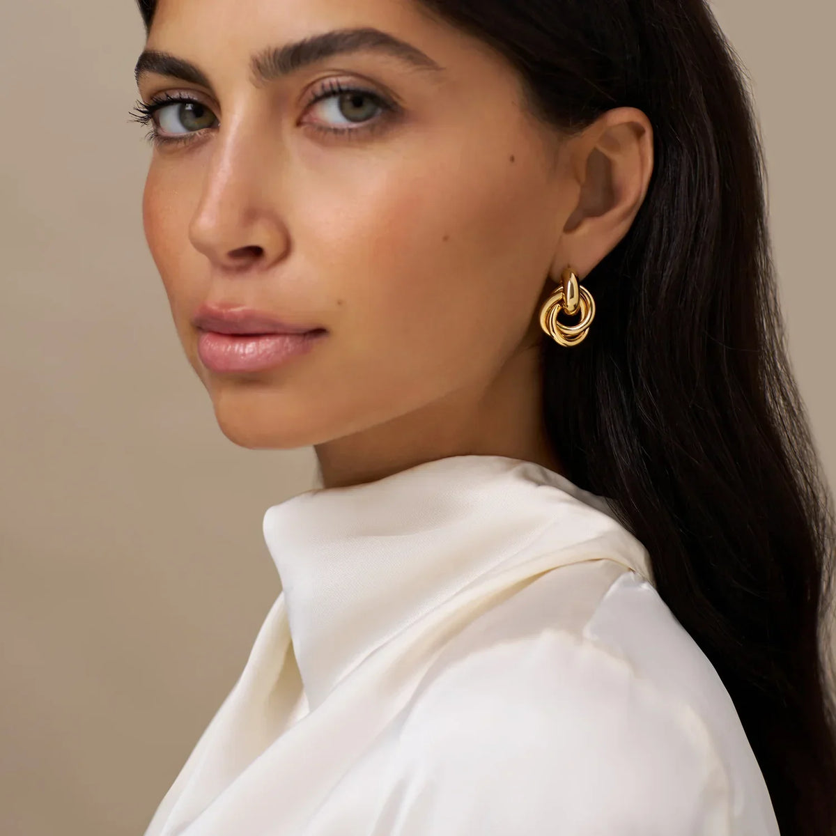 Pendientes statement entrelazados | Oro