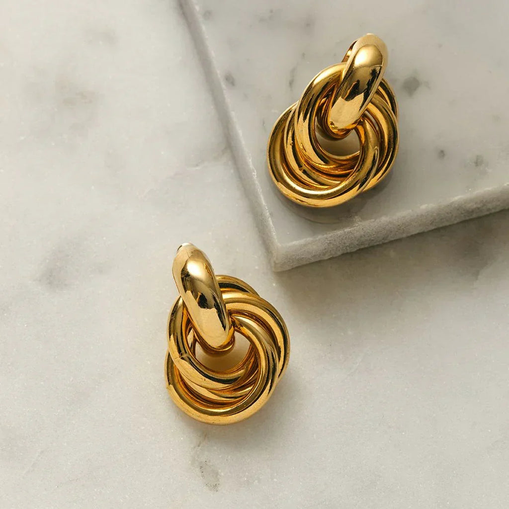 Pendientes statement entrelazados | Oro