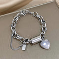 Pulsera gruesa Corazones | Oro blanco