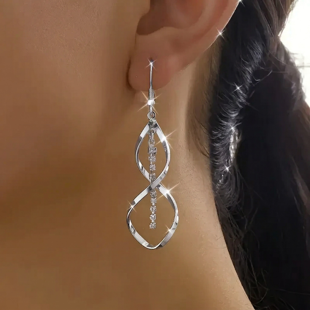 Pendientes espiral Rayo de Sol | Oro