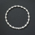Pulsera tenis Racimo clásica | Oro blanco