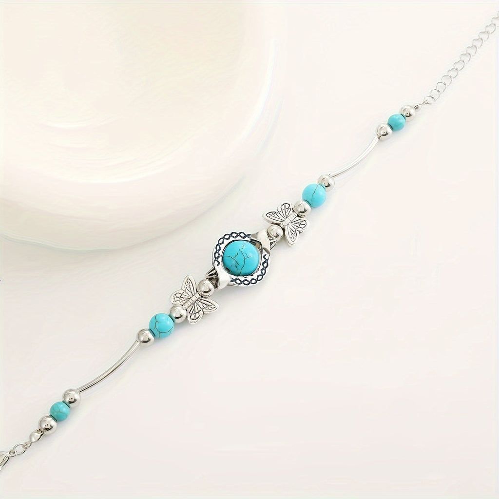 Pulsera Mariposas Oasis | Oro blanco