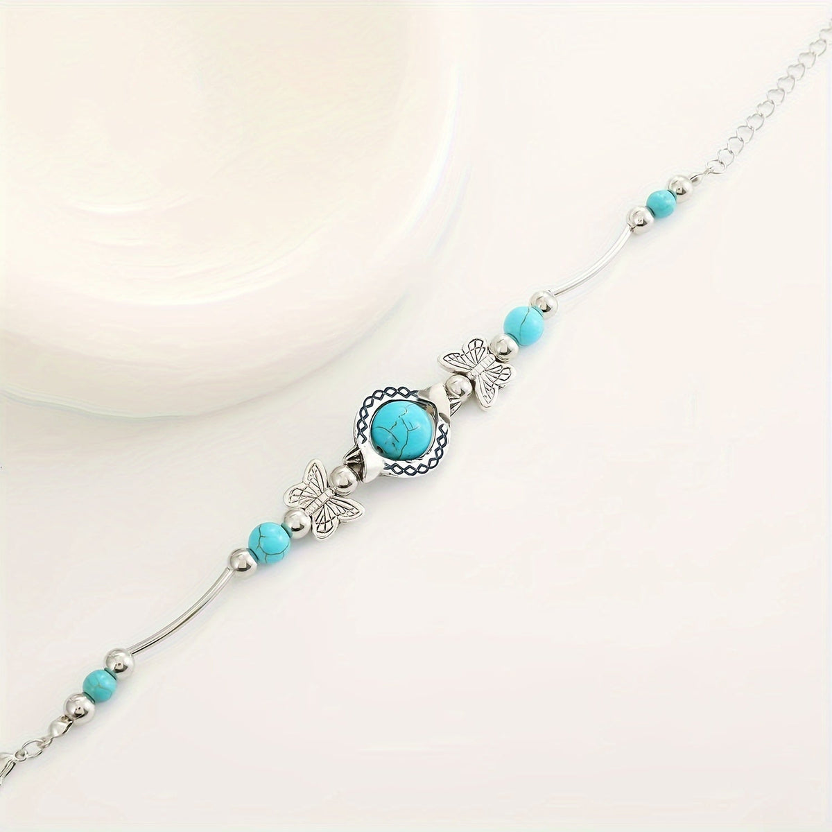 Pulsera Mariposas Oasis | Oro blanco