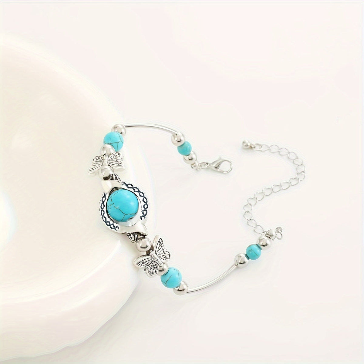 Pulsera Mariposas Oasis | Oro blanco