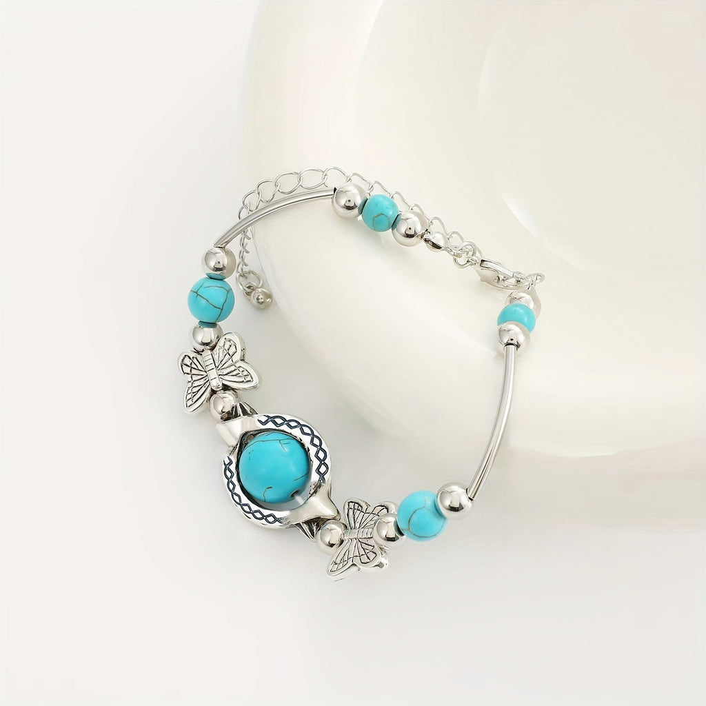 Pulsera Mariposas Oasis | Oro blanco