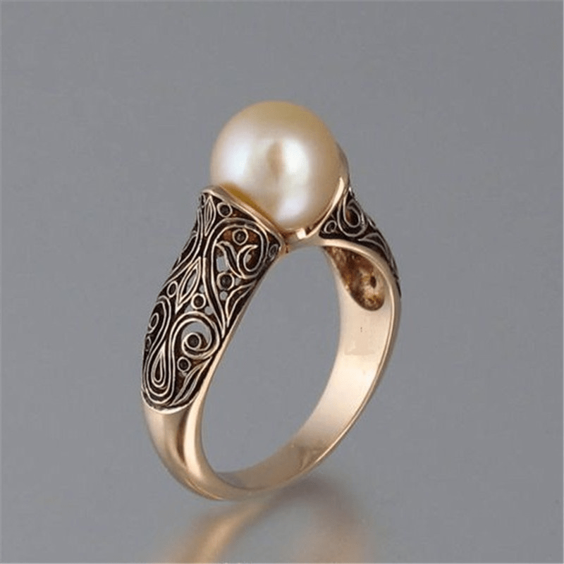 Anillo antiguo dorado con perla | Oro