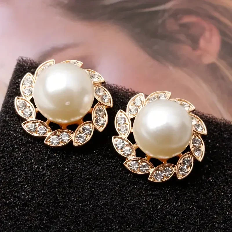 Pendientes de perla y hojas brillantes | Oro
