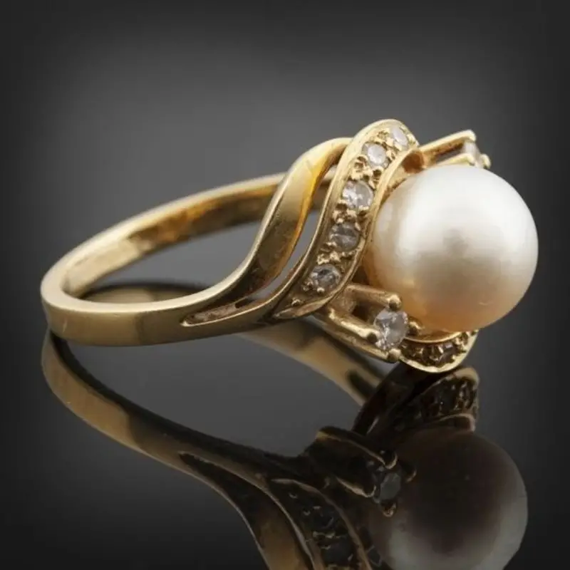 Anillo con perla y brillo dorado | Oro