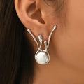 Pendientes antiguos de perla irregular | Oro blanco