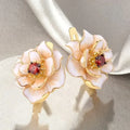 Pendientes Flor Blanca con circonita roja | Oro
