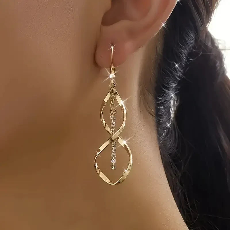 Pendientes espiral Rayo de Sol | Oro