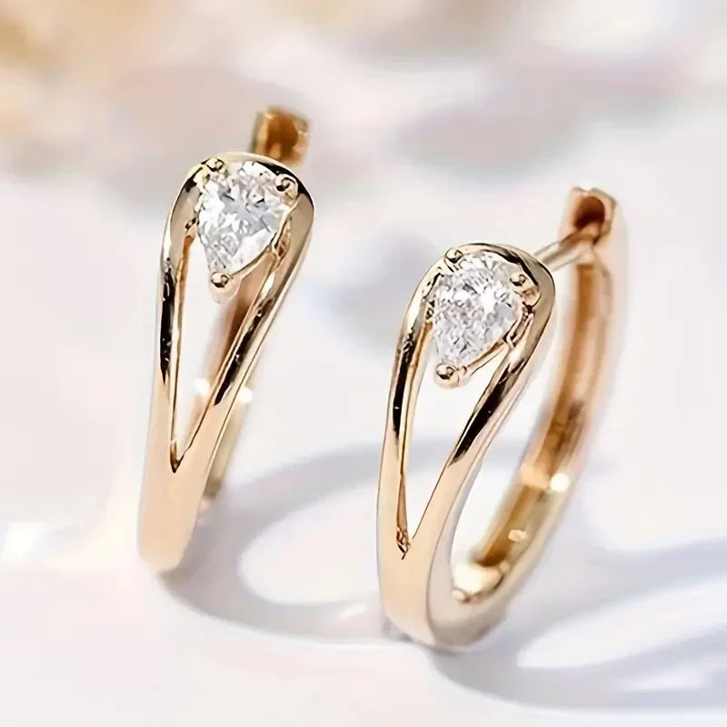 Pendientes colgantes dorados con circonitas | Oro